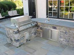 Outdoor Kitchen With Bluestone Patio