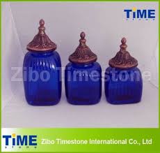 decorative blue glass storage canisters