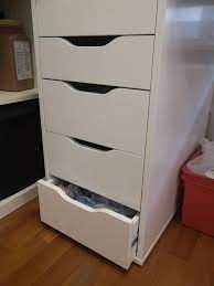 Help - how to remove Alex drawer? Something stuck behind preventing  closing, and I can't get to it because I can't seem to remove the drawer. :  r/IKEA