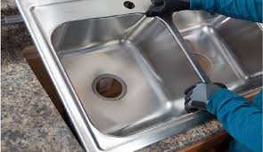 remove a kitchen sink and install
