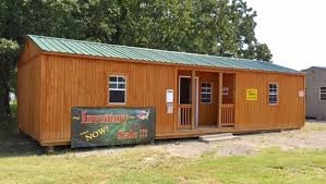 +what is the square footaga os a 16x40 building / cabin. This Is A 16x40 Side Porch Cabin Great Mother In Law Quarters Rental Or Getaway Portable Buildings Portable Cabins For Sale Portable Building Homes 16x40