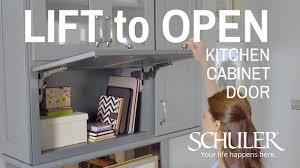 lift to open kitchen cabinet door by