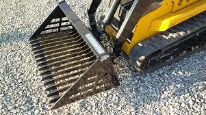 10 must have skid steer attachments