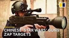 Chinese 'Star Wars' laser gun appears to set fire to objects at a ...