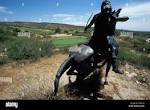 A statue of an Apache warrior overlooking the greens of the Apache ...