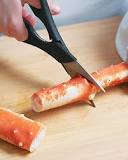 Should I crack crab legs before cooking?