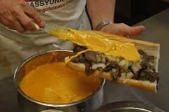 Which Philly cheesesteak uses Cheese Whiz?