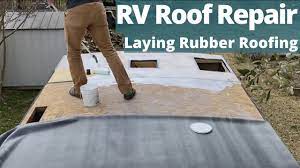 rv roof repair installing a rubber