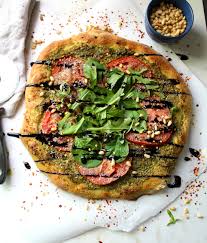 vegan pesto pizza with balsamic glaze