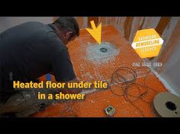 heated floor under tile in a shower l