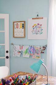 If you like a splash of color, go with a patterned wallpaper or soothing blue paint. Craft Room Refresh Lolly Jane