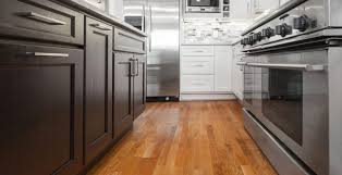 color wood floor with dark cabinets