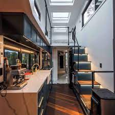 Modern house design on small site witin a tight budget. Couple Constructs Stunning Ultra Modern Tiny House Together Video