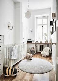 the perfect round rug in the nursery