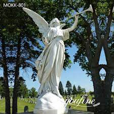 marble angel and trumpet statue