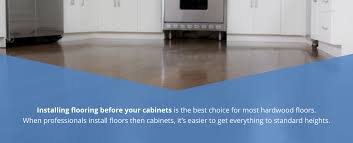 install flooring or cabinets first