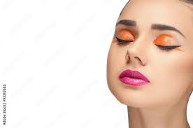 red pink lips and orange eyeshadow