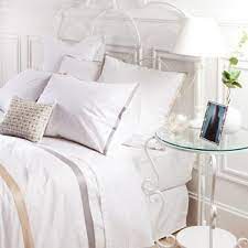 White Bedding With Gold And Silver Trim