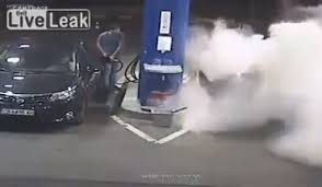 gas station attendant sprays smoking