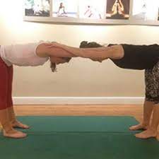 partner poses yogafit yoga teacher