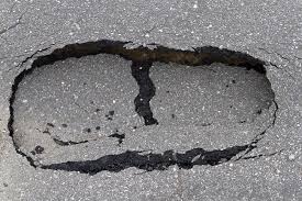 does your asphalt driveway need repair