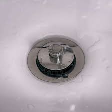 how to remove a bathroom sink stopper