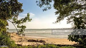The east coast islands are popular snorkeling and diving destinations due to their colorful coral reefs and crystal clear waters. Malaysia Pahang Surfers At Cherating On The East Coast Of Malaysia Cherating Surfer Pahang