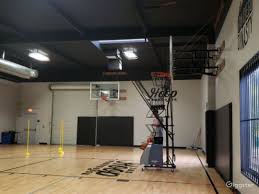 indoor basketball court with wood