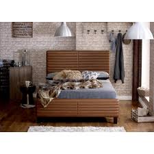 size bed in tan bonded leather