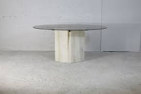 dining table with stone base and smoked