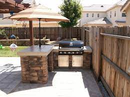 These designs are more like actual kitchens except the main cooking are is an outdoor grill instead of check out the complete outdoor kitchen designs with bar, seating area, storage, and grill. Outdoor Kitchen Ideas For Small Spaces Tips And Trick Small Outdoor Kitchens Backyard Kitchen Small Outdoor Patios