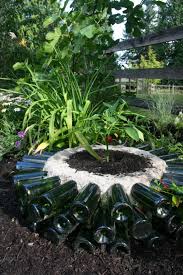 hot garden bed with recycled wine bottles