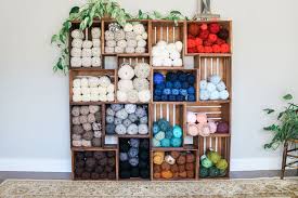 If you find the plastic container is too light and tips over with the slightest whisper you can add weights at the bottom. 15 Clever Yarn Storage Ideas