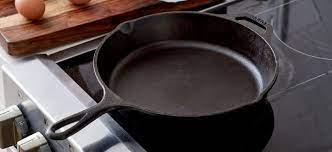 cast iron skillet on glass top stove