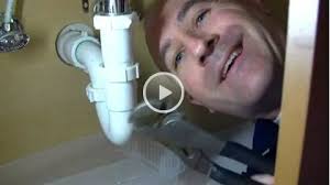 fix a slow draining bathroom sink