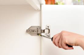 how to adjust cabinet doors