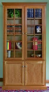 brown wooden glass bookcase sathya