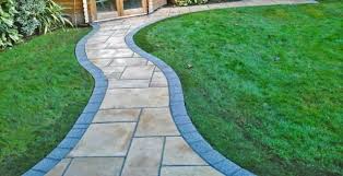 You will need to glue the grass to the surface. Pathways Cardiff Parkstone Wales