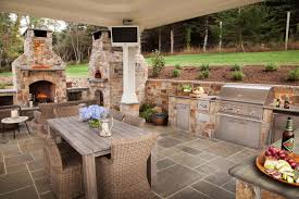 outdoor kitchen fireplace dinning