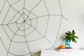 halloween diy spider web made out of yarn