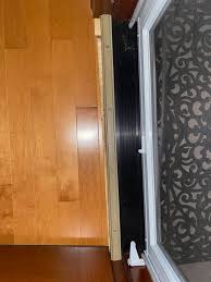front door threshold and hardwood floor
