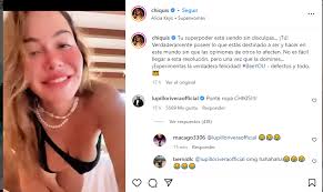 chiquis rivera poses in and