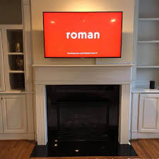 tv mounting above fireplace tv