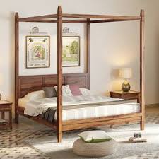 You can read real customer reviews for this or any. Malabar Four Poster Bed Solid Wood Urban Ladder