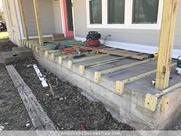 Wooden features, blush pieces, and gold accents make this home collection totally chic. More Front Porch Progress Building A Wood Porch Over An Existing Concrete Porch Addicted 2 Decorating