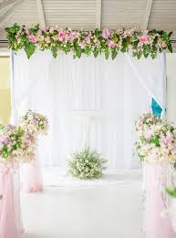 blue wooden arch at wedding ceremony