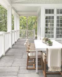 Outdoor dining chairs and patio dining tables not only are perfect for meals, but they also help add to your home's appeal. White Outdoor Dining Table With Wood And Woven Chairs Transitional Deck Patio