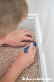 how to rip up carpet