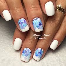 These white nails are quite lovely in their simplicity. Blue And White Elegant Nail Art Design More Like Blue Flowers This Blue And White Nail