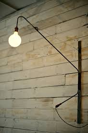 Swing Arm Wall Lamps In The Kitchen
